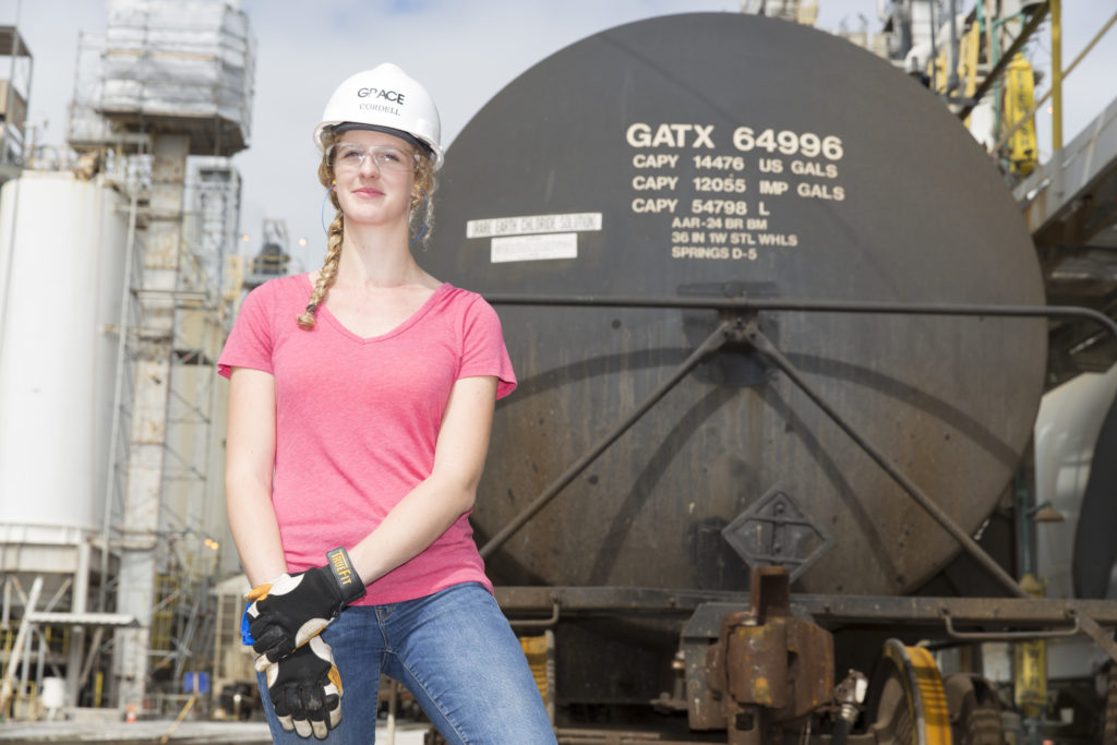 TIME OF HER LIFE: Louisiana Tech grad Lauren Cordell works among trucks and railcars at Grace in Sulphur. (Photo by Lee Celano)