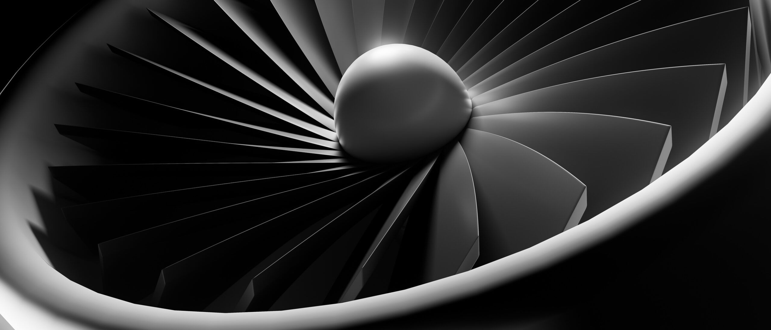 A close up of a jet engine with a black and white filter