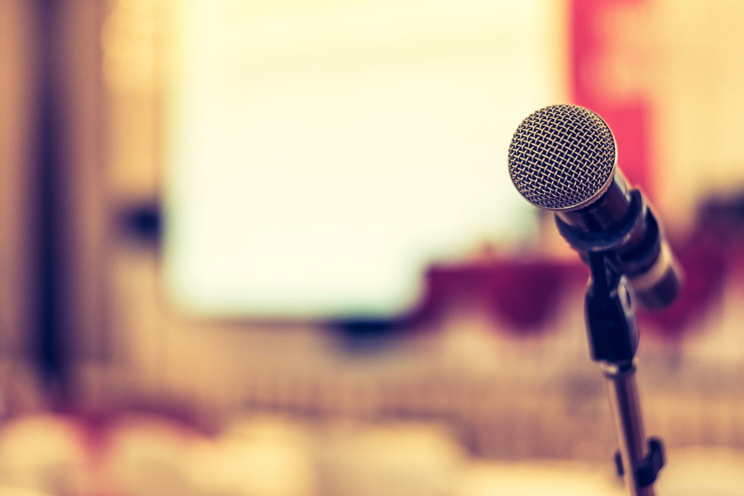 Microphone voice speaker in business seminar, speech presentation, town hall meeting, lecture hall or conference room in corporate or community event for host or public hearing